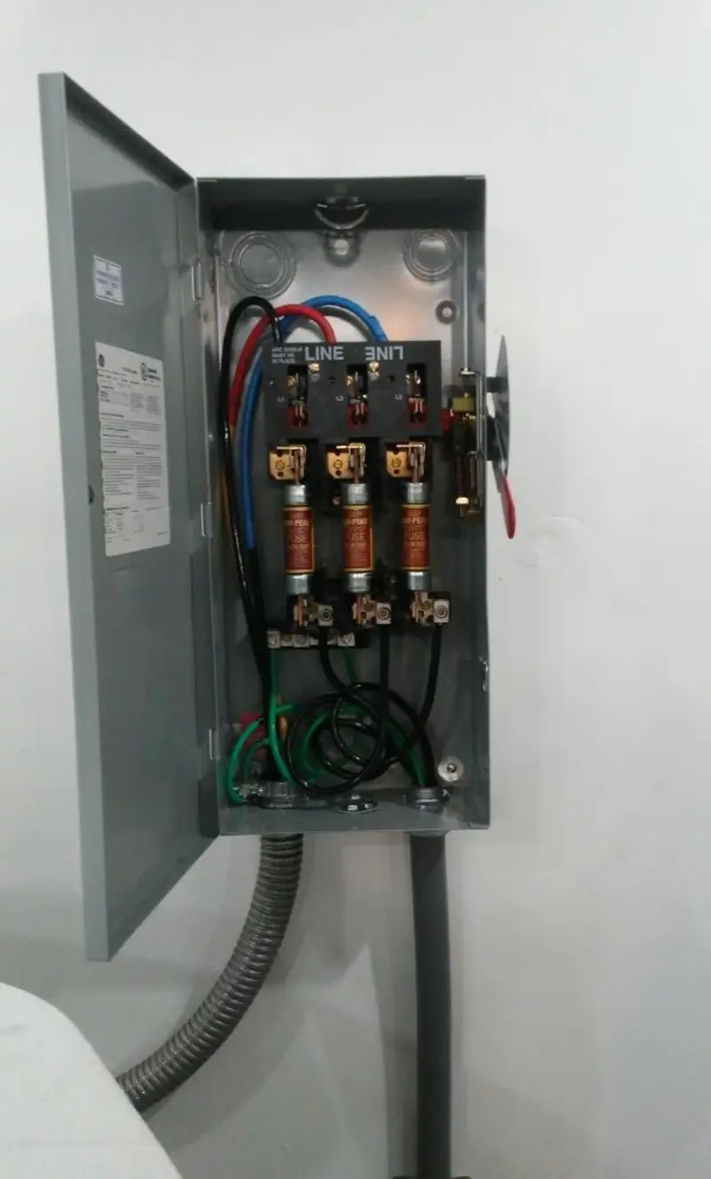 Three-phase disconnect switch installed for Smoke Detector Installation in Island Lake